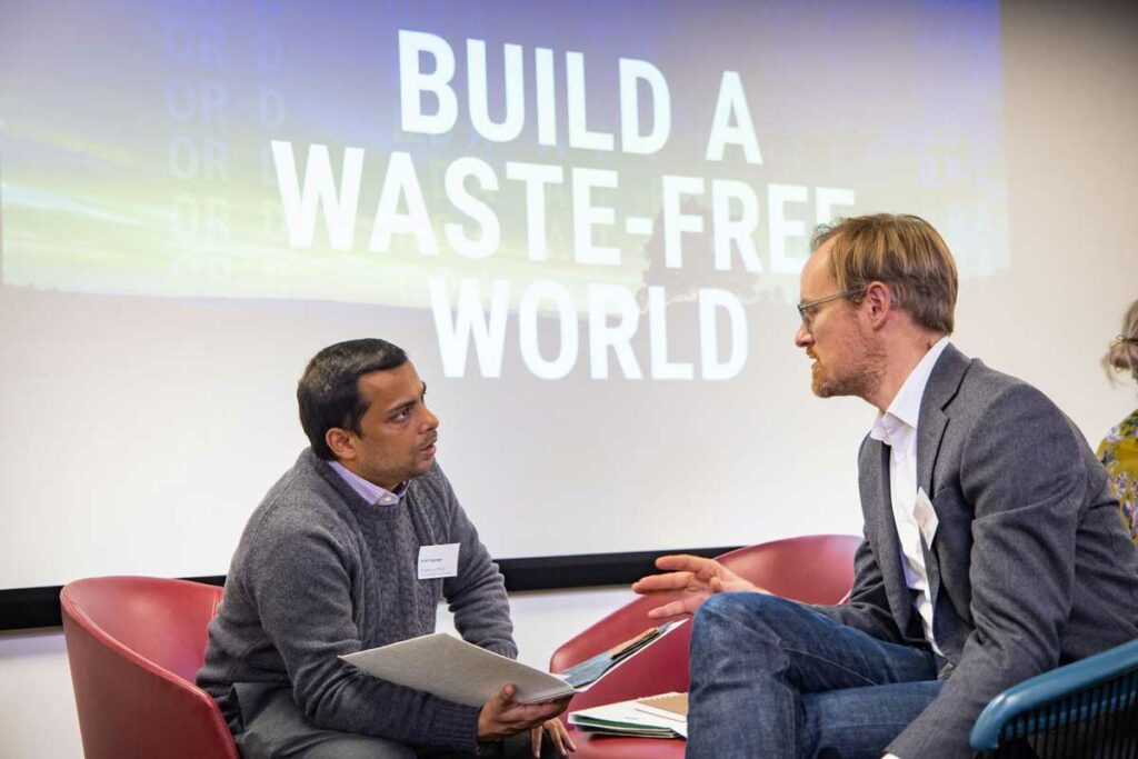 Ankit Argarwal (Fleather) talks with an advisor at the Deloitte networking event