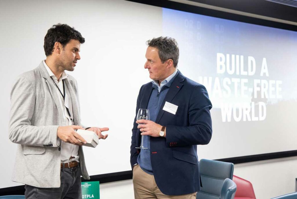 Rodrigo Garcia Gonzalez (Notpla) talks with an advisor at the Deloitte networking event