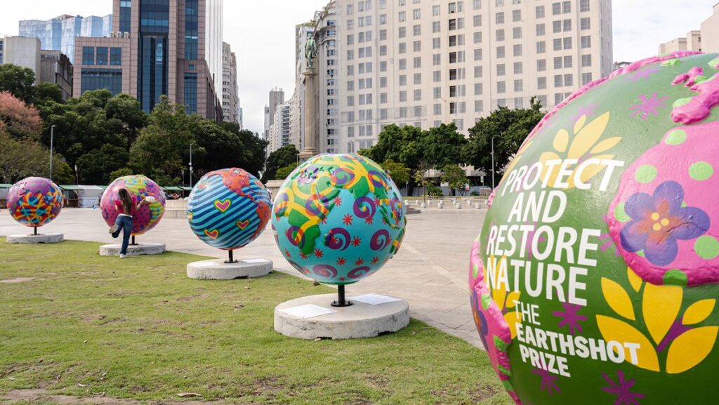 Woman hugging Cool Globes